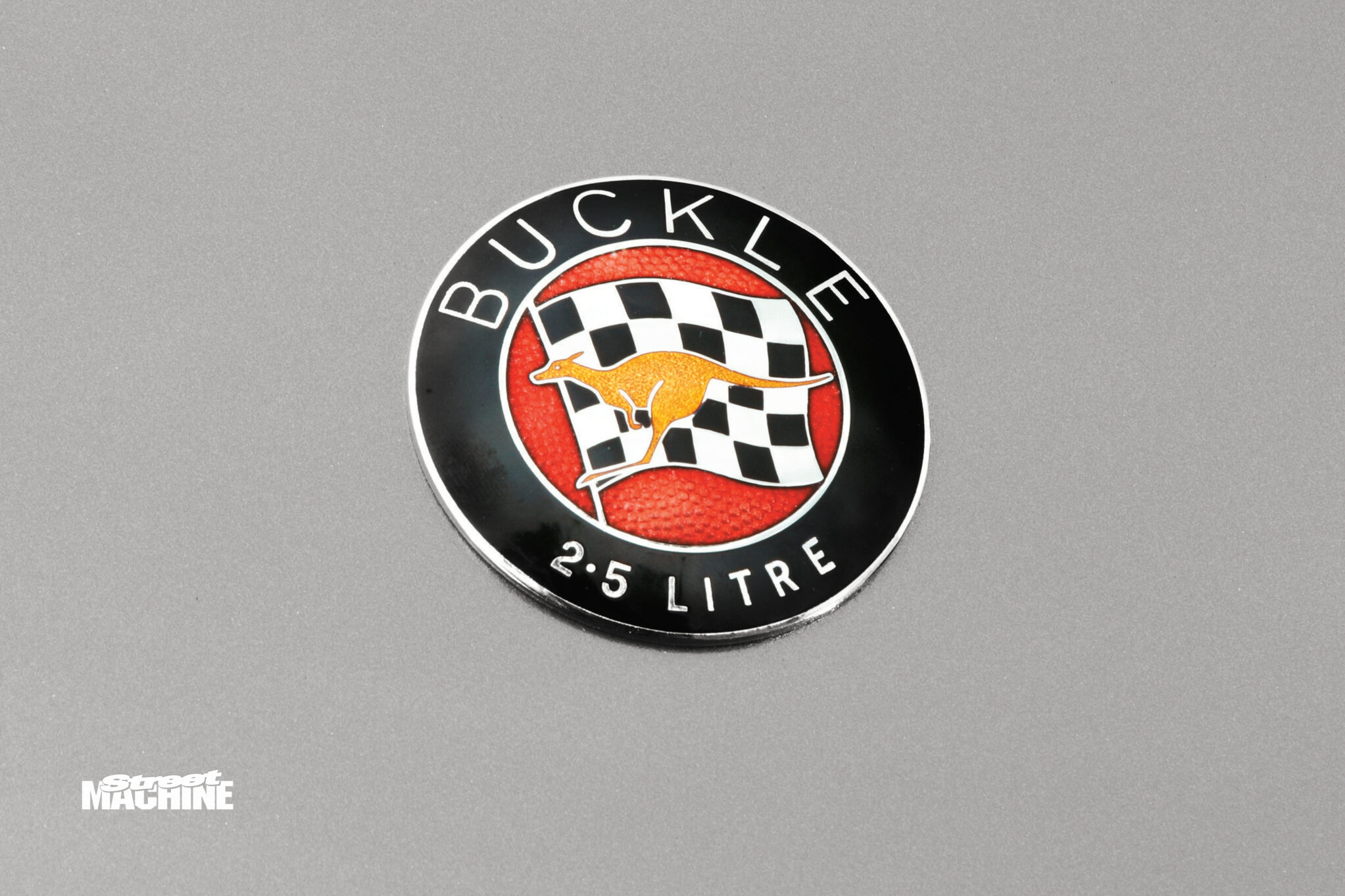 1770124d/buckle sports car badge wm jpg